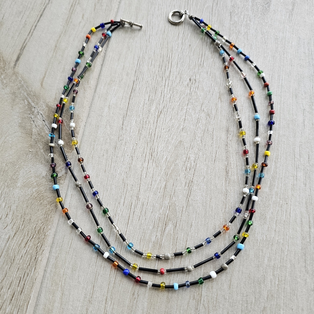 Three-Strand Black Seed Bead Necklace with Multicolor Accents